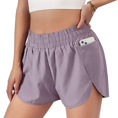 Shorts de running de secado rápido con bolsillos color lila